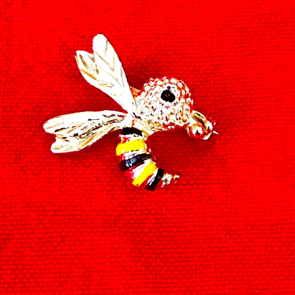 Adorable vintage golden bee pin with striped body